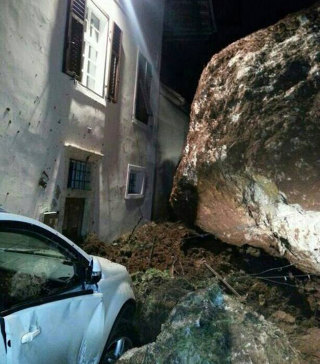 Illustration for article titled Giant boulder destroys building in Italy, another one misses by inches